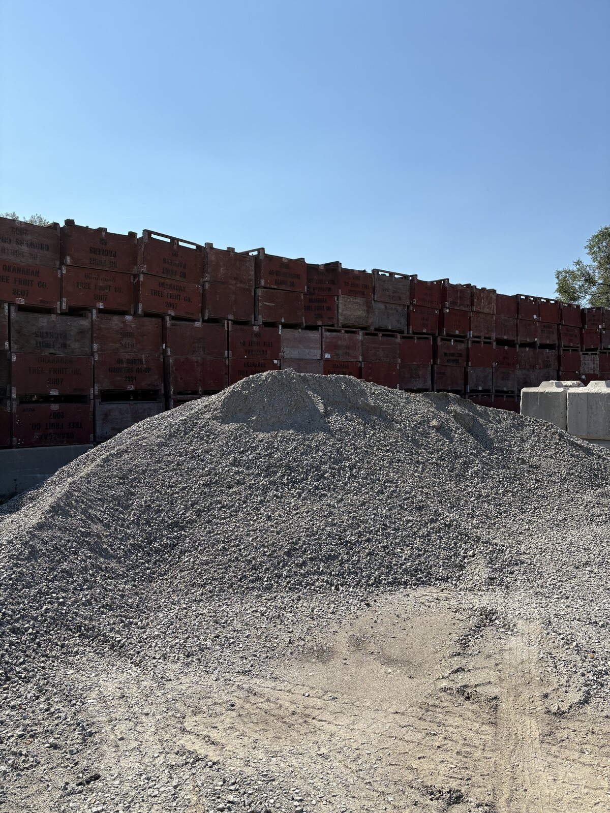 Aggregate stockpiles and yard conditions at ReLoad Okanagan